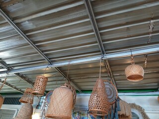 unique lamp shape with straw around the lamp