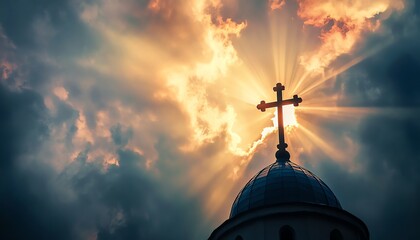 Sunset illuminates a cross against dark clouds.