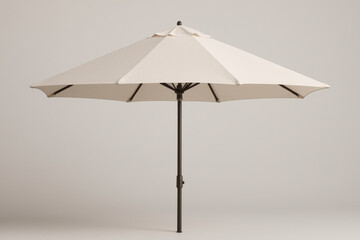 Large beige patio umbrella open on plain background