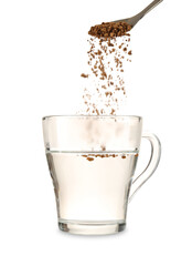Adding granulated instant coffee from spoon into glass cup with boiled water isolated on white,...