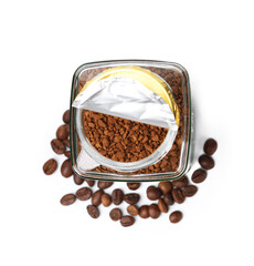 Instant coffee in glass jar and beans isolated on white, top view