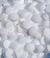top view of industrial salt pills for pool cleaning