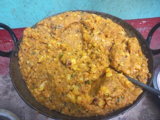 Roasted samosa potatoes mashala in a large iron pan,Samosa potatoes roasted in a big pan,Ready made...