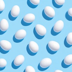 White eggs arranged in a repeating pattern on a light blue background
