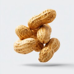 A cluster of peanuts, captured mid-air, with a focus on texture and form. The image highlights the peanuts' unique shapes and the intricate details of their shells