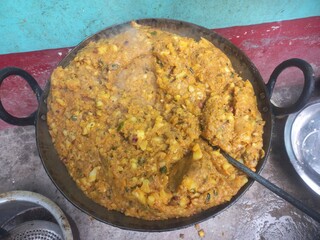 Roasted samosa potatoes mashala in a large iron pan,Samosa potatoes roasted in a big pan,Ready made...