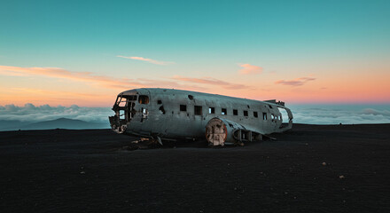 Texture and Background of a Crashed Ship in Yellow Biola Landscape at Sunset Over a Plane Wreck on Black Sand, Captured from a Scenic Viewpoint