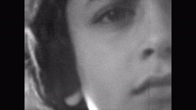 Old film, Teenage girl serious portrait looking at camera, close up. Growing up irritation stage. Indifference adolescence. Between age. Awkward transitional stage. Vintage archive. Archival retro