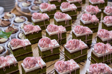 chocolate cakes on wooden plate in wedding party reception