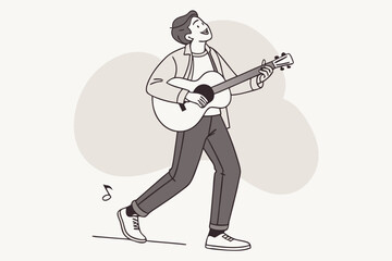 Obraz premium Young man playing guitar