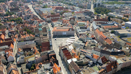 Fototapeta premium Aerial view of the old town and market place in the city Augsburg in Germany on an sunny day in spring
