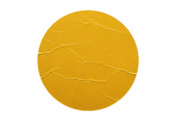 A golden yellow circle sticker with a peeled edge isolated on transparent background, ideal for adding to your designs