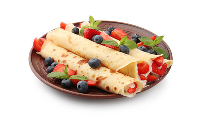 Tasty crepes with berries, cream and mint isolated on white