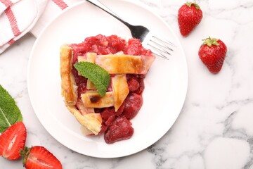 Tasty strawberry pie and berries on white marble table, flat lay