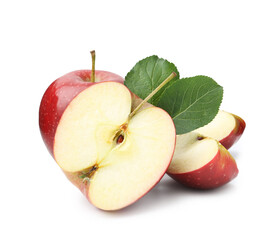 Cut, whole apples and leaves isolated on white