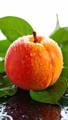 Close Up Of A Ripe Peach With Water Droplets Surrounded By Green Leaves Against A White Background