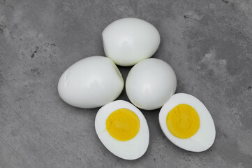 Hard-boiled eggs, whole and in cross-section