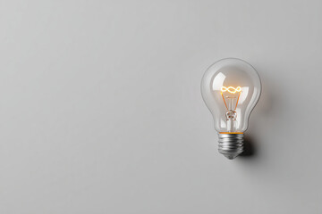Light bulb on against a basic background as concept of idea