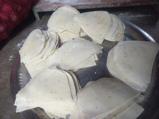 Raw Samosa ready to be fried  famous Indian snack food,How to make crispy and flaky samosa,A very...