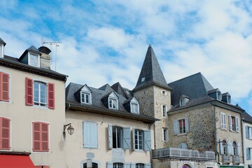 Charming architecture showcasing historic buildings with red and blue shutters