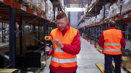Logistics worker scanning barcodes in a warehouse, managing inventory and ensuring efficient operations
