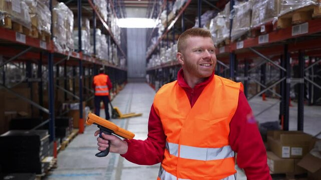 Warehouse logistics worker carefully scanning packages using barcode scanner, managing inventory efficiently with handheld electronic device