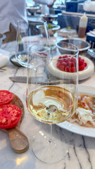 Golden-hued wine glass reflects Summer Tomato Festival, divine gastronomic symphony, ripe heirloom harvest, culinary passion ignites jubilee