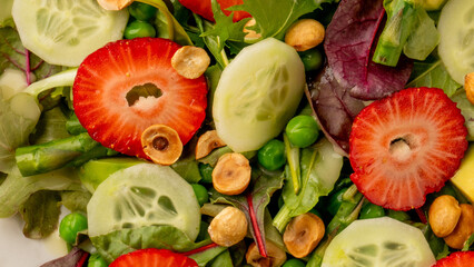 Crunchy cucumber and luscious strawberry salad, bursting with springtime vibrancy, perfect for Holi...