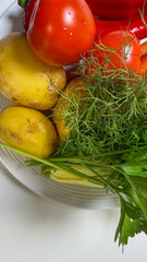 Freshly picked garden medley, earthy potatoes, dewy tomatoes, vibrant dill, harmonizing for...