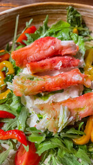 Lush crab claws rest on a vibrant bed of greens, evoking coastal Thanksgiving feasts and Neptune Day celebrations
