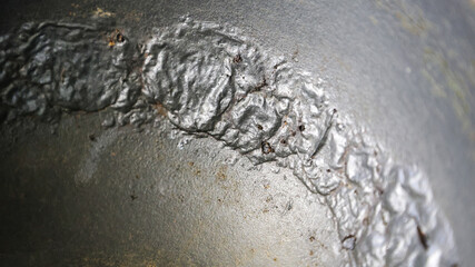 Damaged Interior a Pot: Peeling, Cracking, and Bubbling of Non-Stick Coating Revealed.