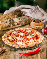 Stone-baked pizza crowned with flecks of fiery chili and wisps of mozzarella, embracing International Hot and Spicy Food Day spirit