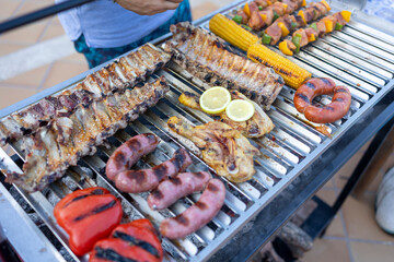 Delicious barbecue food grilling on a hot grill