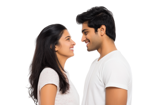 loving couple gazing at each other with admiration and smiling warmly isolated on white background