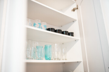 Kitchen cabinet organization. Kitchen cleaning up.
