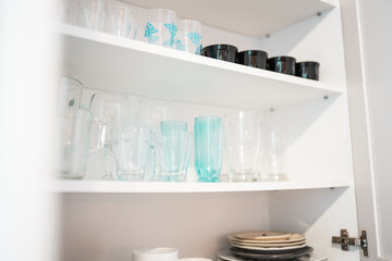 Kitchen cabinet organization. Kitchen cleaning up.