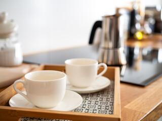 Making coffee in coffee pot in kitchen, close-up