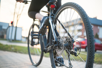 Girl Rides A Mountain Bike In The City Park