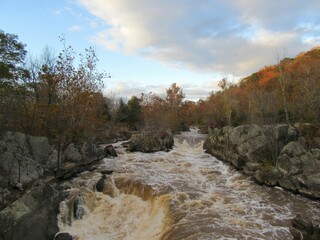 picturesque river with flowing waters in autumn 