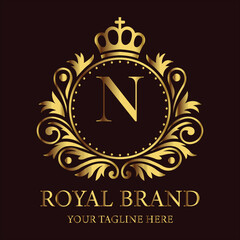 Golden vintage 10th-anniversary celebration emblem with a clock and abstract background design LOGO N