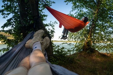 Relaxing in Hammocks by the Lake