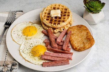 fried  eggs with waffles and spam  sticks