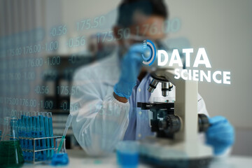Data science Scientist working laboratory with microscope and test tubes, analyzing data and...