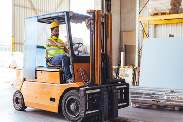 Warehouse Worker Operating a Forklift in a Busy Industrial Environment