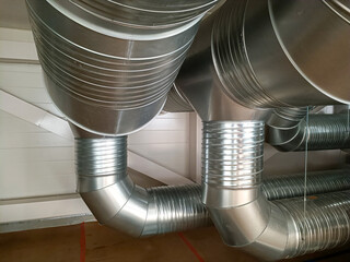 Air ventilation in buildings. Ventilation pipes in the attic of the house