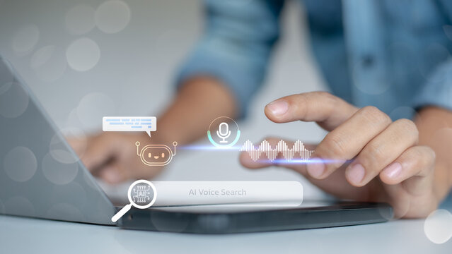 Finger touching AI voice search interface on tablet with virtual assistant chatbot icon, representing artificial intelligence, voice recognition, and smart assistant technology.