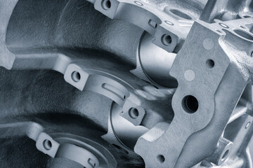 car engine disassembled, auto service concept background blue tone.