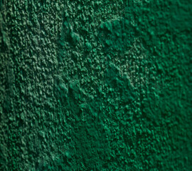 Close-up of textured green surface in abstract design