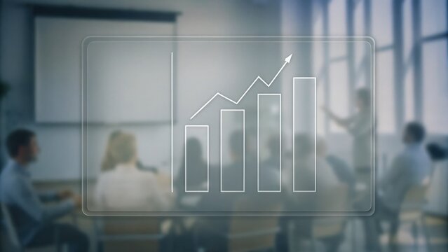 A team in a meeting room views a digital graph showing rising business growth projections on a transparent screen.