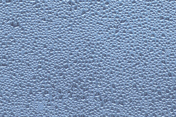 Glass is covered with many drops of water